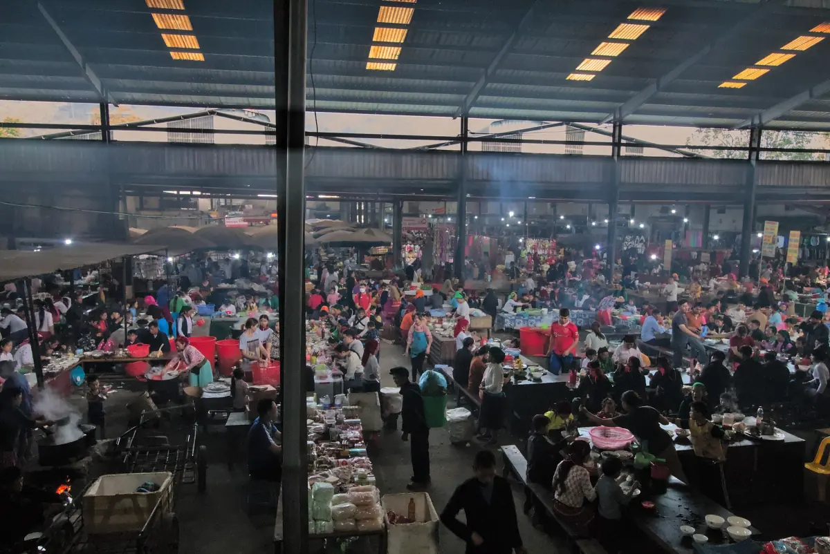 Large covered market hall in Meo Vac seen from above