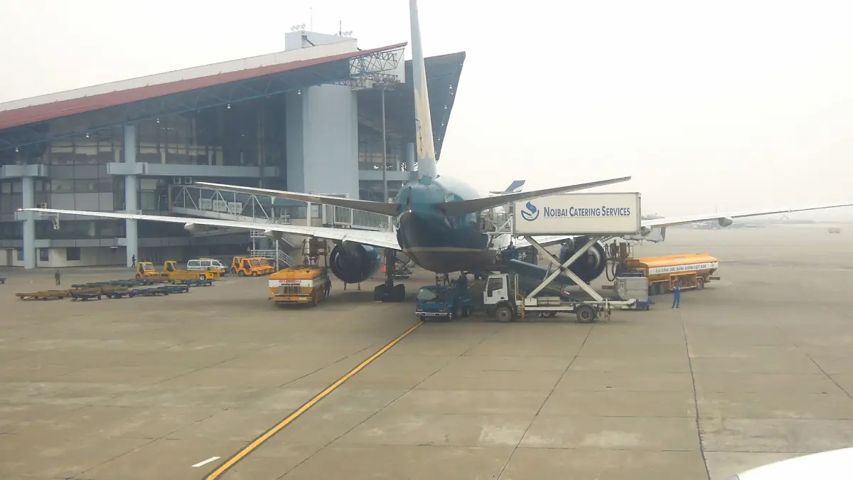 Aircraft on the apron beside the terminal at Noi Bai airport